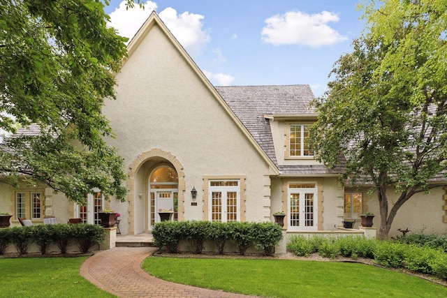 490 Old Long Lake Rd, Orono, MN 55391 - view of front facade with french doors, a front lawn, and stucco siding