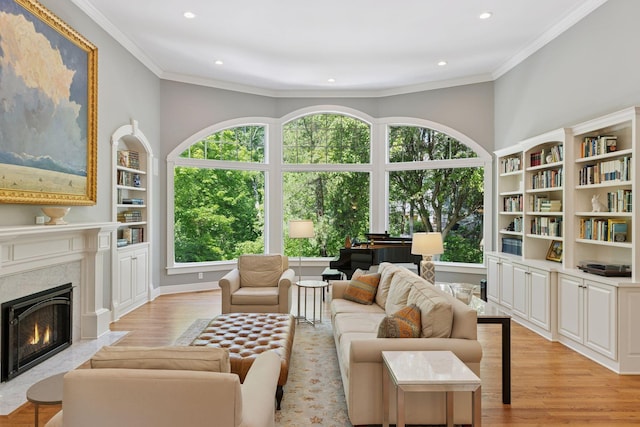 490 Old Long Lake Rd, Orono, MN 55391 - living room with light wood-style flooring, recessed lighting, a high end fireplace, built in shelves, and crown molding