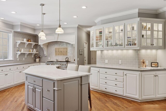490 Old Long Lake Rd, Orono, MN 55391 - kitchen with a kitchen island, backsplash, white cabinets, gray cabinets, and recessed lighting