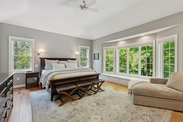 490 Old Long Lake Rd, Orono, MN 55391 - bedroom featuring light wood-type flooring, vaulted ceiling, ceiling fan, and baseboards