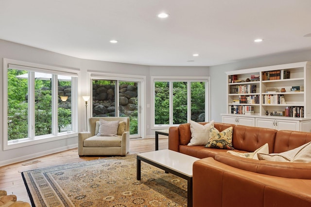 490 Old Long Lake Rd, Orono, MN 55391 - living area with recessed lighting, healthy amount of natural light, baseboards, and light wood finished floors