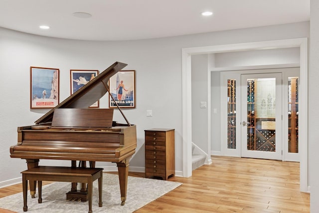 490 Old Long Lake Rd, Orono, MN 55391 - living area with wood finished floors, baseboards, and recessed lighting