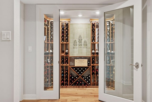 490 Old Long Lake Rd, Orono, MN 55391 - wine cellar featuring wood finished floors and recessed lighting