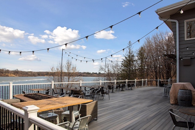 490 Old Long Lake Rd, Orono, MN 55391 - wooden terrace with outdoor dining space, a water view, and grilling area