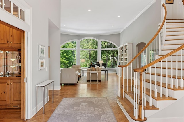 490 Old Long Lake Rd, Orono, MN 55391 - entrance foyer with ornamental molding, recessed lighting, and stairs