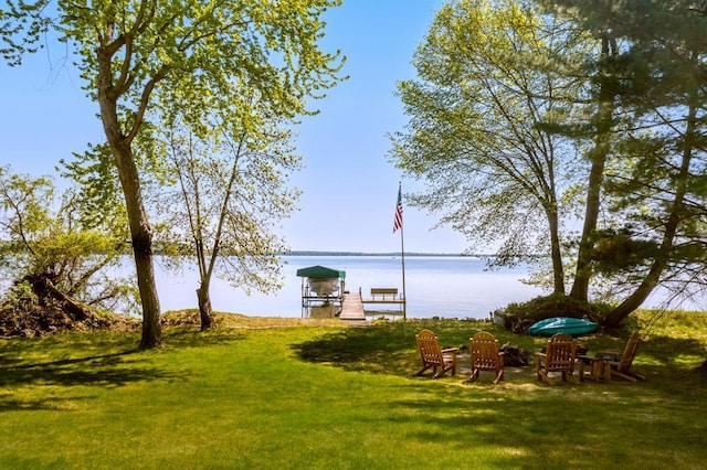 8744 Interlachen Rd, Lake Shore, MN 56468 - dock featuring a water view, a yard, and boat lift