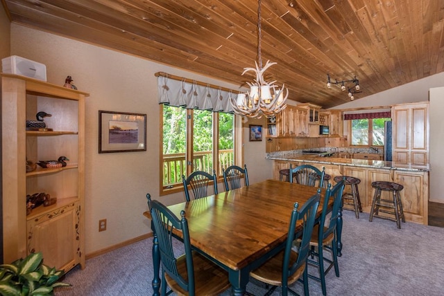 8744 Interlachen Rd, Lake Shore, MN 56468 - carpeted dining space featuring a chandelier, vaulted ceiling, wooden ceiling, and baseboards