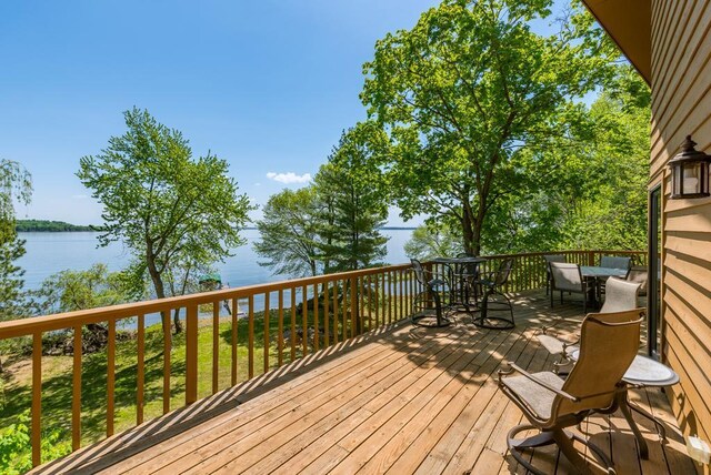 8744 Interlachen Rd, Lake Shore, MN 56468 - deck featuring outdoor dining space and a water view