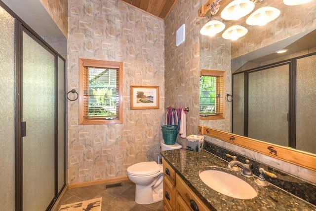 8744 Interlachen Rd, Lake Shore, MN 56468 - bathroom featuring a stall shower, vanity, toilet, tile patterned floors, and lofted ceiling