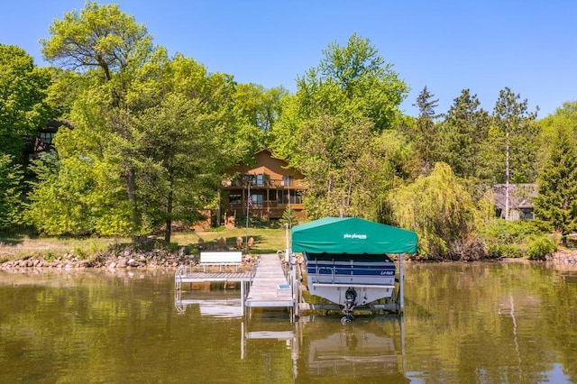 8744 Interlachen Rd, Lake Shore, MN 56468 - dock featuring boat lift, a water view, and a view of trees