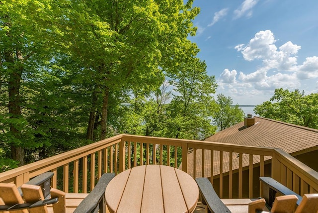 8744 Interlachen Rd, Lake Shore, MN 56468 - wooden terrace with a water view and outdoor dining space