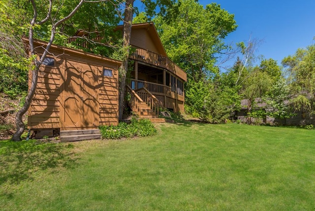 8744 Interlachen Rd, Lake Shore, MN 56468 - view of grassy yard with stairway and a wooden deck
