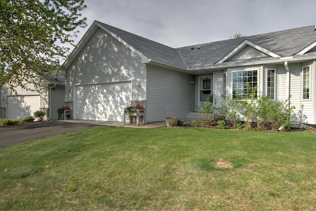 910 Shady Ridge Ln, Braham, MN 55006 - single story home featuring an attached garage, driveway, a front lawn, and roof with shingles