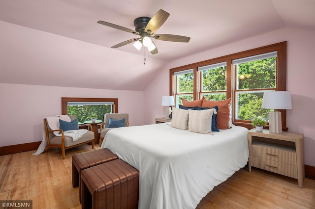 920 2nd St S, Stillwater, MN 55082 - bedroom with vaulted ceiling, light wood-style flooring, and ceiling fan
