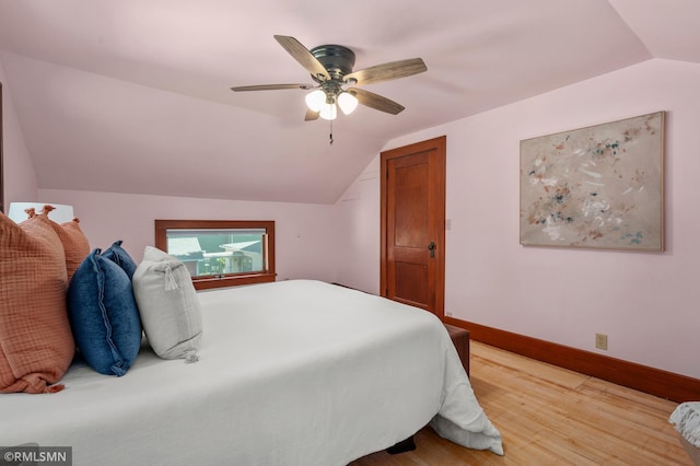 920 2nd St S, Stillwater, MN 55082 - bedroom with lofted ceiling, ceiling fan, and light wood finished floors