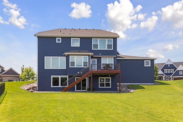 62 Rapp Farm Blvd, North Oaks, MN 55127 - rear view of house with stairs, a wooden deck, and a lawn