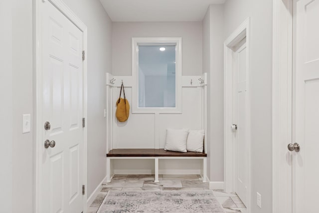 62 Rapp Farm Blvd, North Oaks, MN 55127 - mudroom featuring light marble finish floors and baseboards