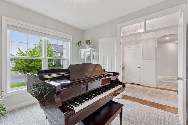 62 Rapp Farm Blvd, North Oaks, MN 55127 - living area with arched walkways and baseboards