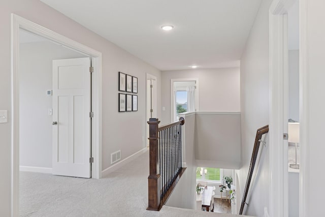 62 Rapp Farm Blvd, North Oaks, MN 55127 - corridor featuring an upstairs landing, carpet, plenty of natural light, baseboards, and recessed lighting