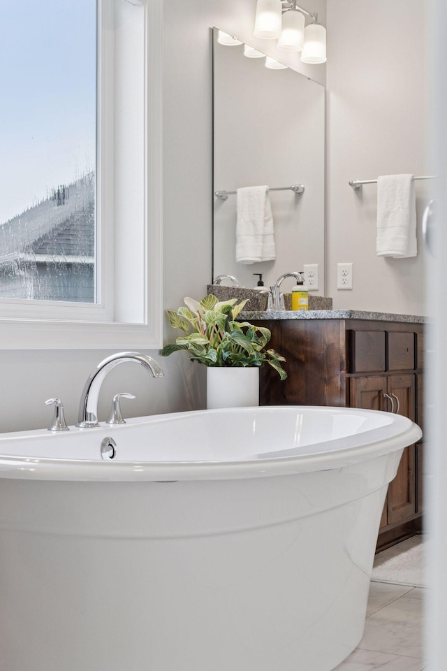 62 Rapp Farm Blvd, North Oaks, MN 55127 - bathroom with a soaking tub and marble finish flooring