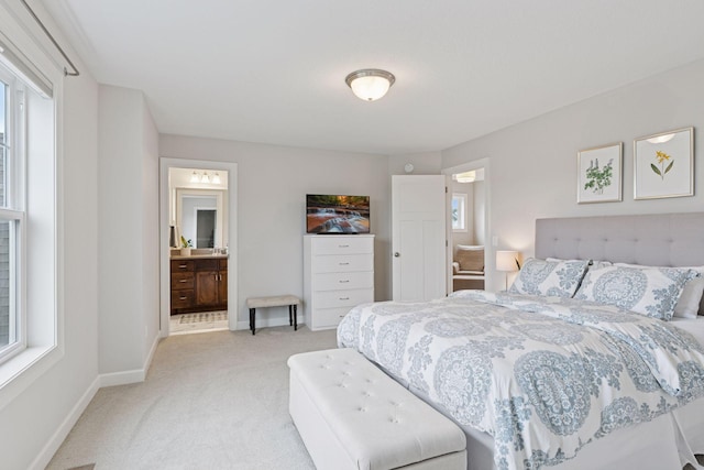 62 Rapp Farm Blvd, North Oaks, MN 55127 - bedroom featuring light colored carpet, baseboards, and ensuite bath