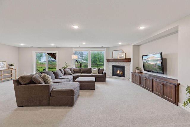 62 Rapp Farm Blvd, North Oaks, MN 55127 - carpeted living area with a glass covered fireplace and recessed lighting