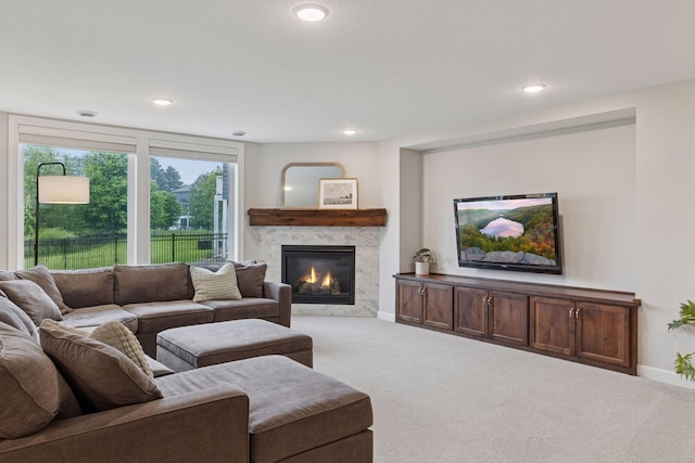 62 Rapp Farm Blvd, North Oaks, MN 55127 - carpeted living room with a high end fireplace, recessed lighting, and baseboards