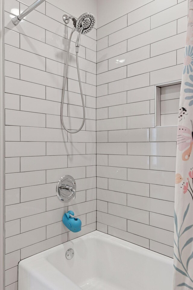 62 Rapp Farm Blvd, North Oaks, MN 55127 - bathroom featuring shower / tub combo