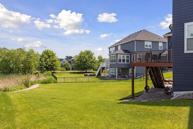 62 Rapp Farm Blvd, North Oaks, MN 55127 - view of yard featuring stairway and a wooden deck