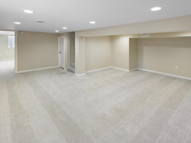 10308 Belmont Rd, Minnetonka, MN 55305 - below grade area with recessed lighting, light carpet, and baseboards