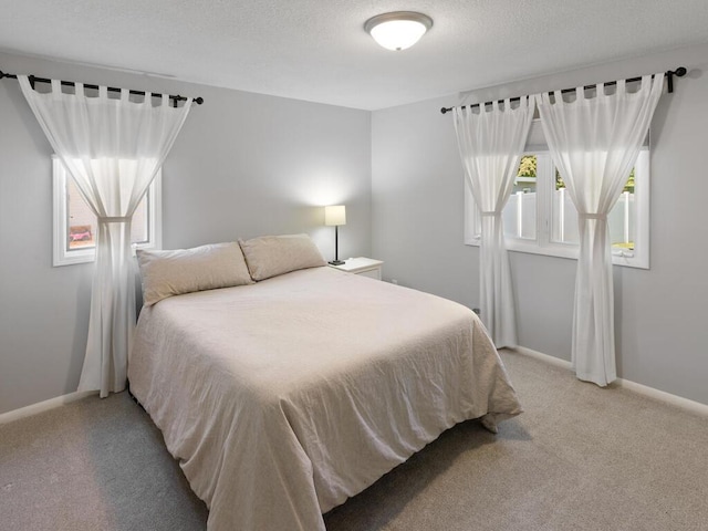 10308 Belmont Rd, Minnetonka, MN 55305 - bedroom with light carpet and baseboards