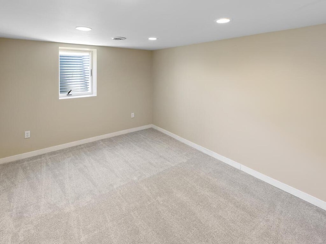10308 Belmont Rd, Minnetonka, MN 55305 - spare room with carpet floors, baseboards, and recessed lighting