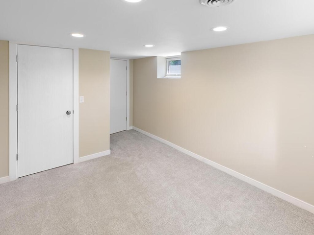 10308 Belmont Rd, Minnetonka, MN 55305 - below grade area featuring light carpet, baseboards, and recessed lighting