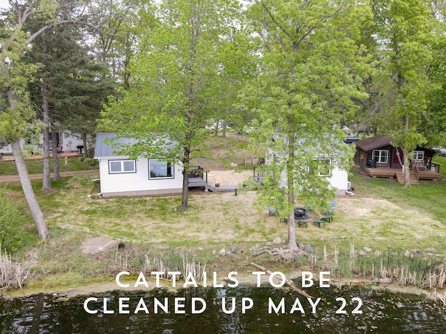 11445 State Highway 48, Trade Lake, WI 54853 - view of front of house with a deck and metal roof