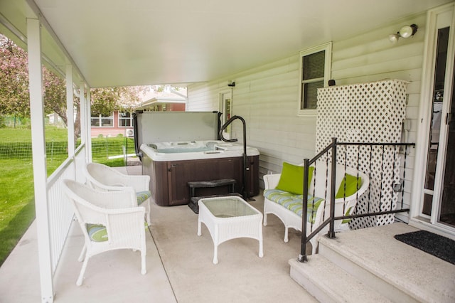 view of patio / terrace featuring a hot tub