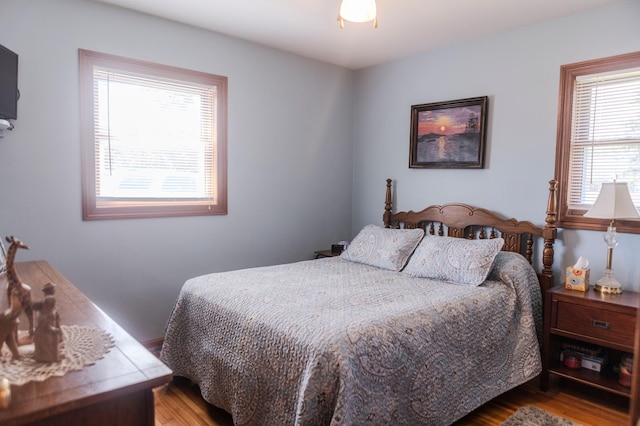 bedroom featuring wood finished floors