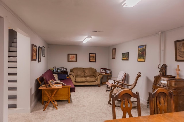 living area with carpet and baseboards