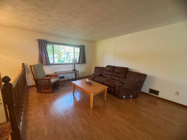 1601 8th Ave NE, Owatonna, MN 55060 - living room featuring wood finished floors and baseboards
