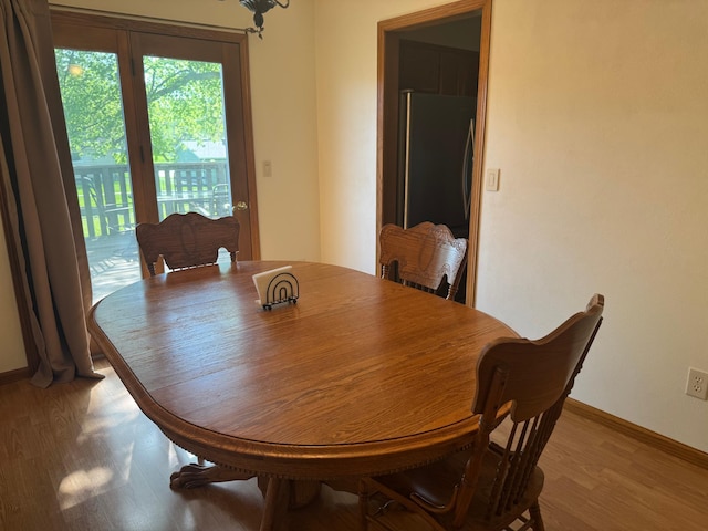 1601 8th Ave NE, Owatonna, MN 55060 - dining space featuring light wood finished floors and baseboards