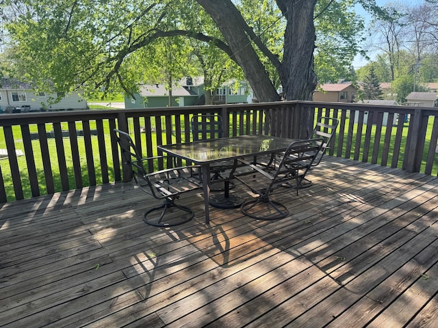 1601 8th Ave NE, Owatonna, MN 55060 - wooden terrace featuring outdoor dining space and a yard