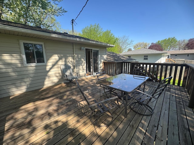 1601 8th Ave NE, Owatonna, MN 55060 - wooden deck featuring outdoor dining space