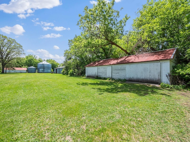 8418 State Highway 29 S, Alexandria, MN 56308 - view of green lawn featuring an outbuilding and a detached garage