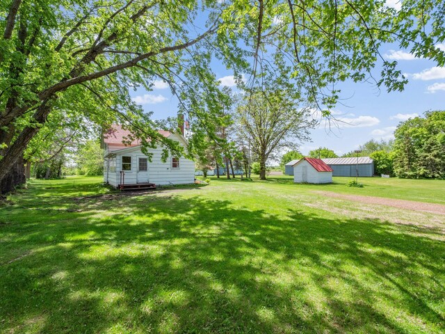 8418 State Highway 29 S, Alexandria, MN 56308 - view of green lawn with an outdoor structure