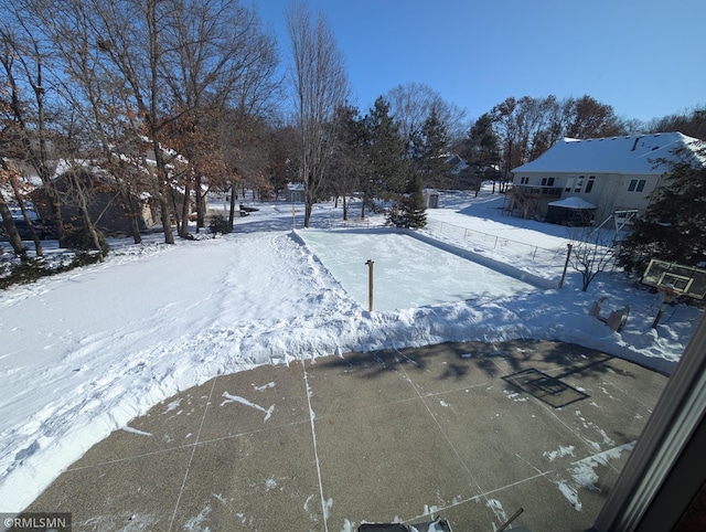view of yard covered in snow