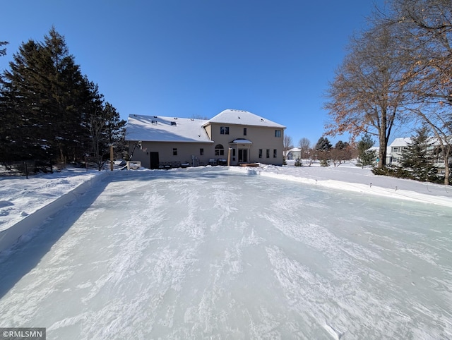 view of snow covered property