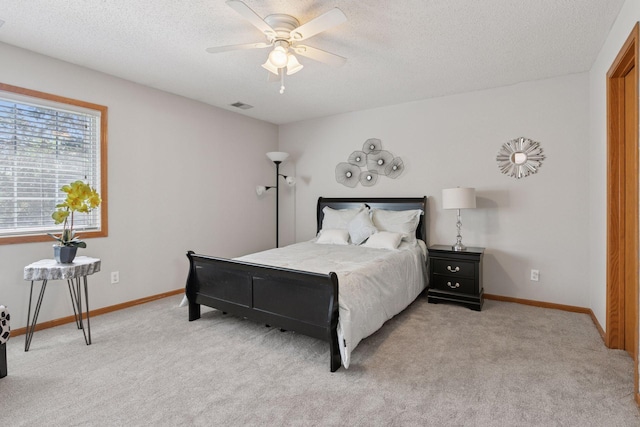1515 Yorkshire Ln, Shakopee, MN 55379 - bedroom featuring light colored carpet, a textured ceiling, baseboards, and ceiling fan
