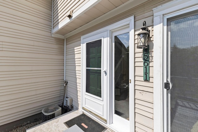 entrance to property with central AC unit