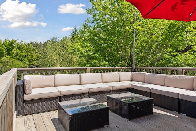 32875 Stanton Trl, Cannon Falls, MN 55009 - wooden deck featuring an outdoor living space and a view of trees