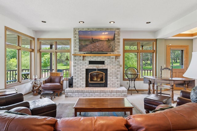 32875 Stanton Trl, Cannon Falls, MN 55009 - carpeted living area with a fireplace, baseboards, and recessed lighting