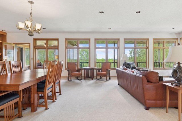 32875 Stanton Trl, Cannon Falls, MN 55009 - dining space featuring a chandelier, light carpet, plenty of natural light, and recessed lighting